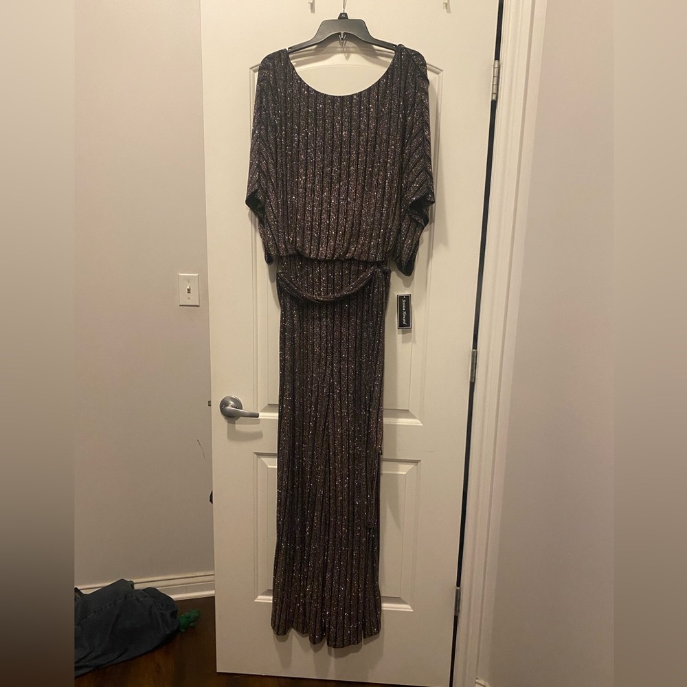 Black and gold glitter jump suit size XL